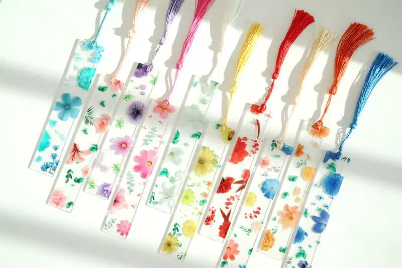 Marcapáginas de flores con diseño de margarita transparente