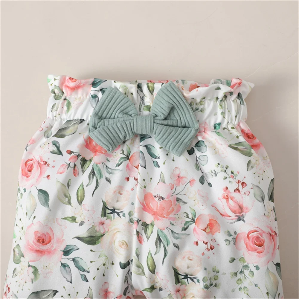 Conjunto niña 0-18 meses: pelele verde con top y pantalón floral - imagen 3