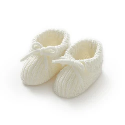 Zapatos de primeros pasos tejidos para niña con lazo antideslizante