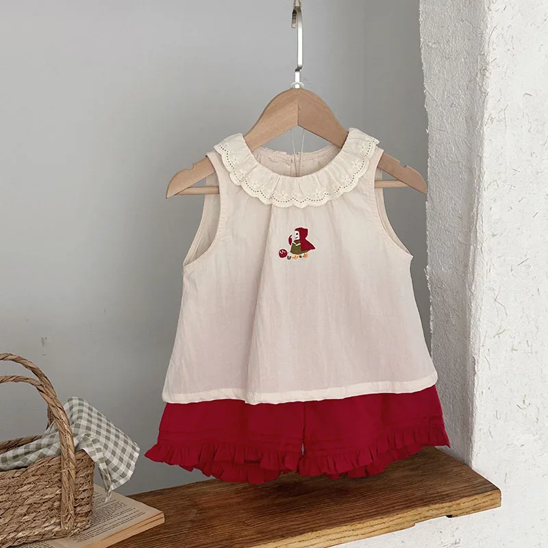Camiseta sin mangas y cuello con ruches