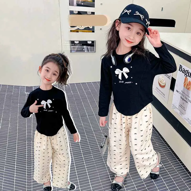 Conjunto niña de blusa con lazo primaveral y pantalón