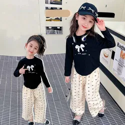 Conjunto niña de blusa con lazo primaveral y pantalón