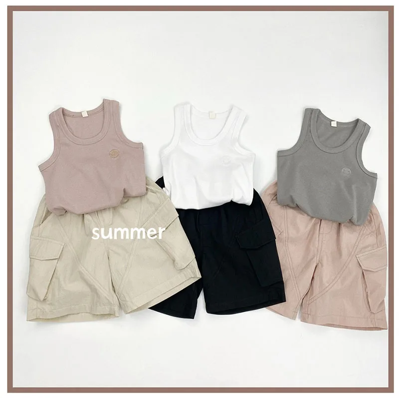 Pantalones harem infantiles en beige con bolsillo lateral