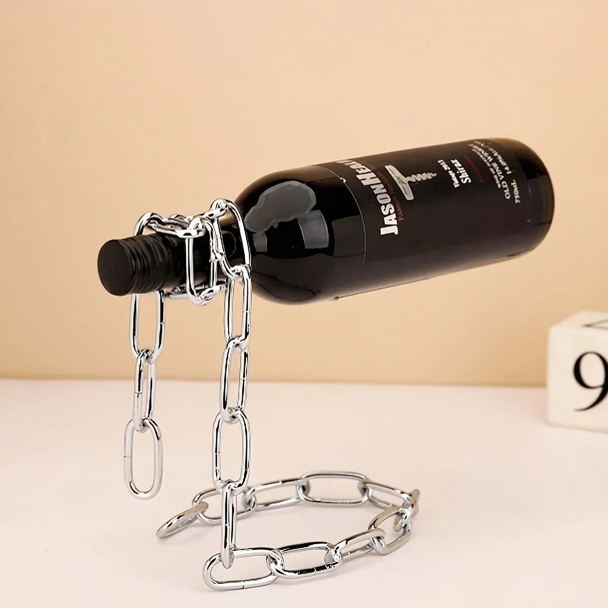 Soporte colgante con cadena de hierro para botellas