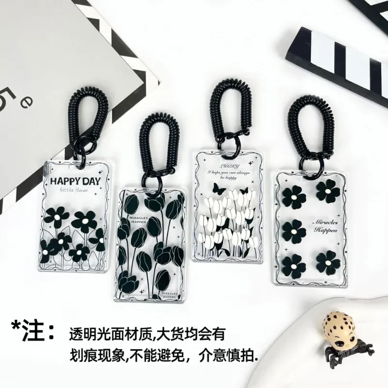 Funda transparente para tarjetas de bebé con diseño floral negro - imagen 2