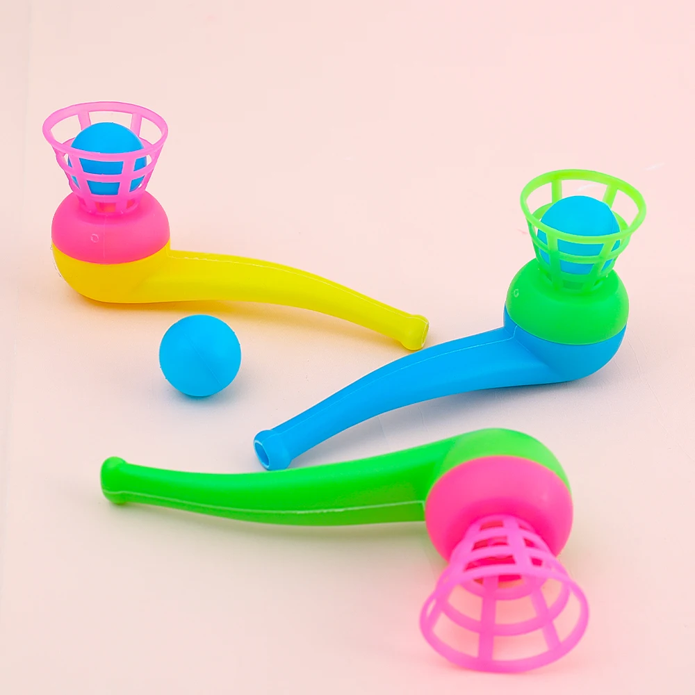 Juego de equilibrio con bola sopladora plástica colorida para bebé