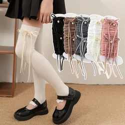 Calcetines altos con lazo de cinta y arco hasta la rodilla