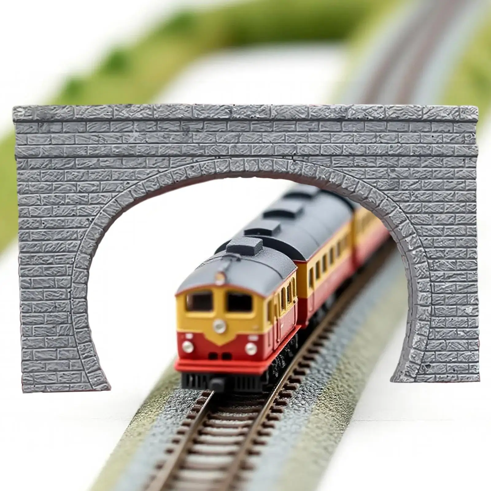 Detalle del portal de túnel en escala N sobre base