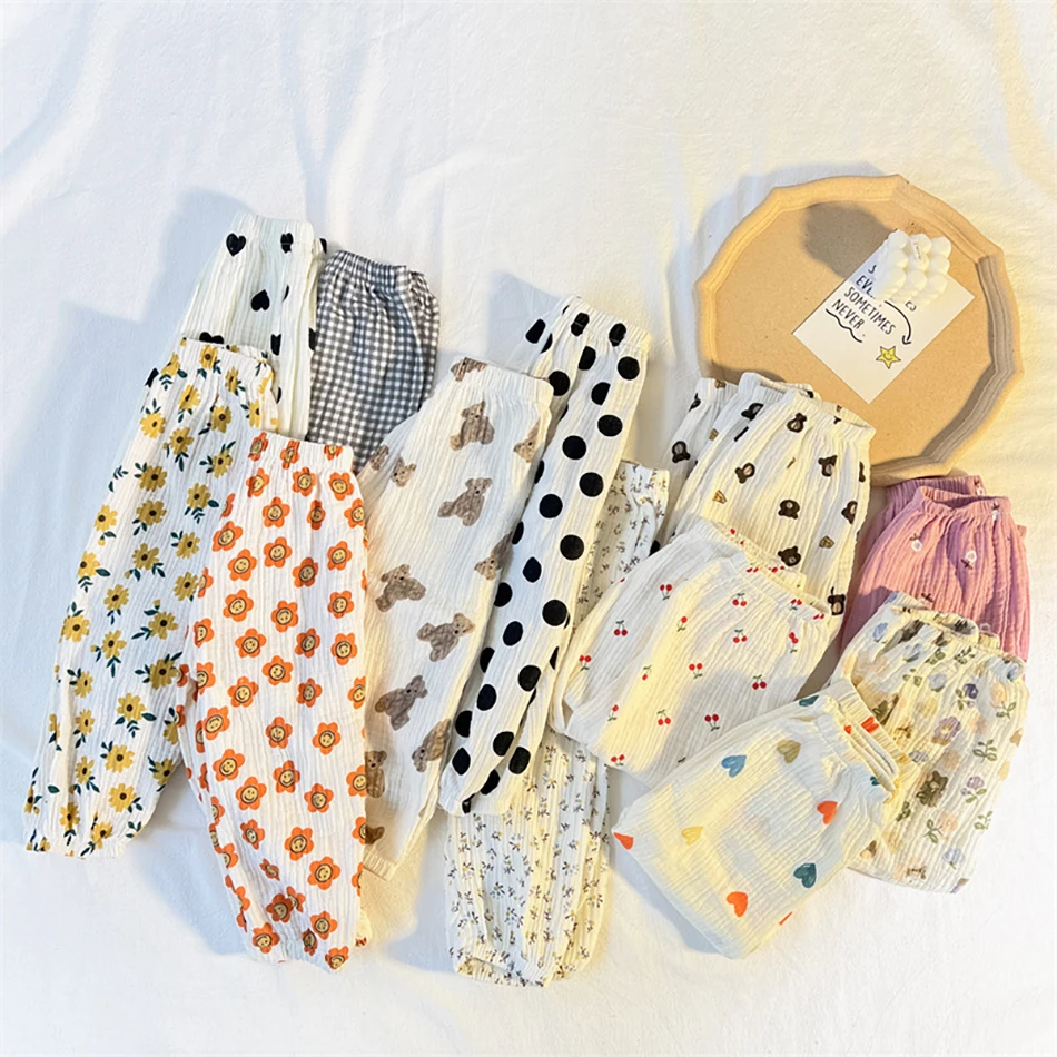 Pantalones de bebé de muselina estampada con cintura elástica