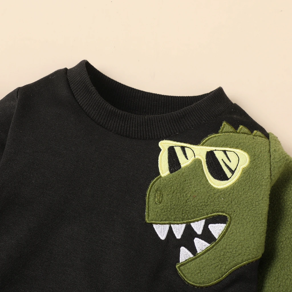 Detalle del estampado de dinosaurio