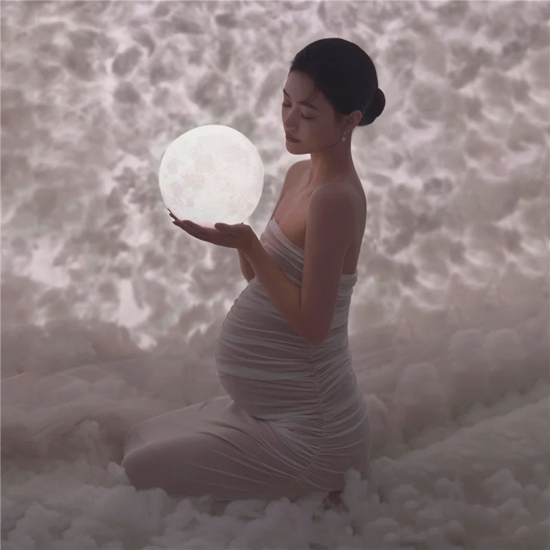 Vestido de maternidad blanco con hombros descubiertos para fotos