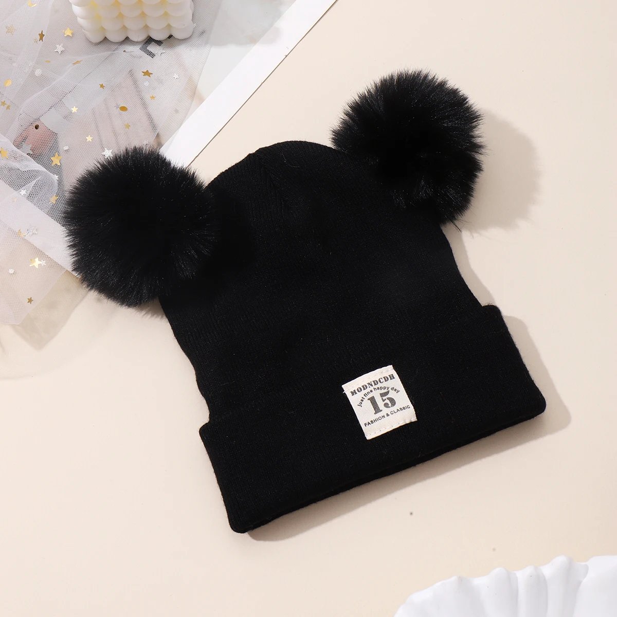 Gorro de punto infantil con pompón