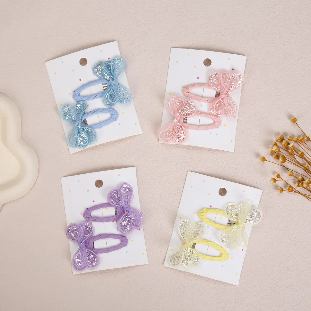 Pinzas de mariposa con lentejuelas para niñas