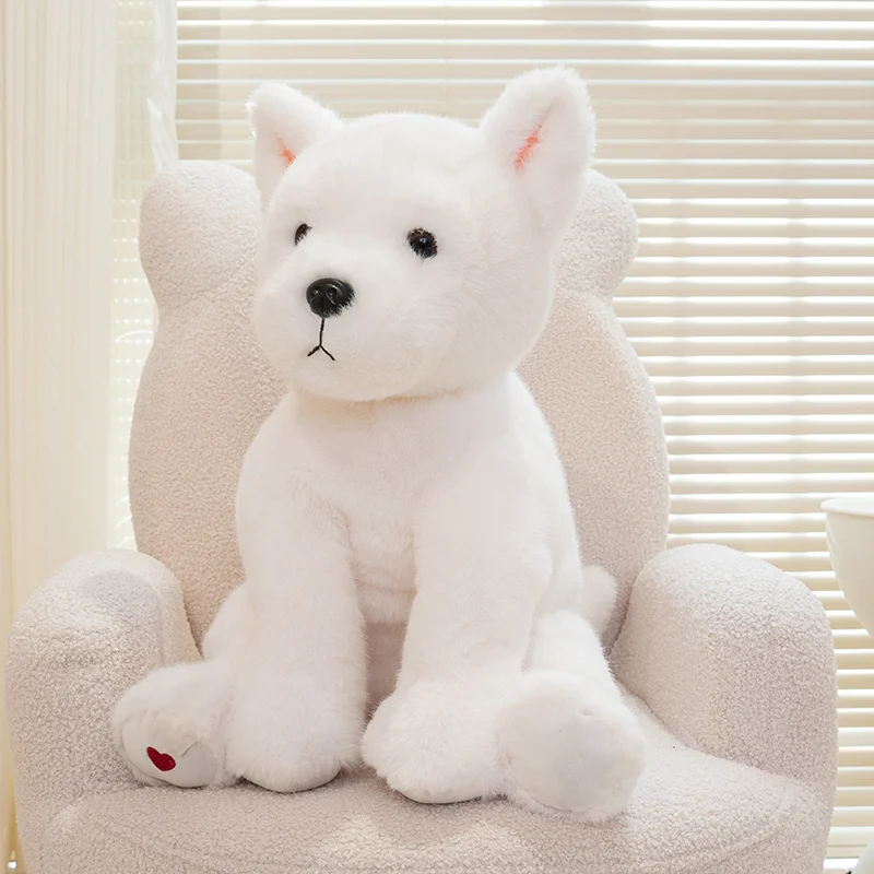 Detalle del peluche con pelaje suave y ojos de botón