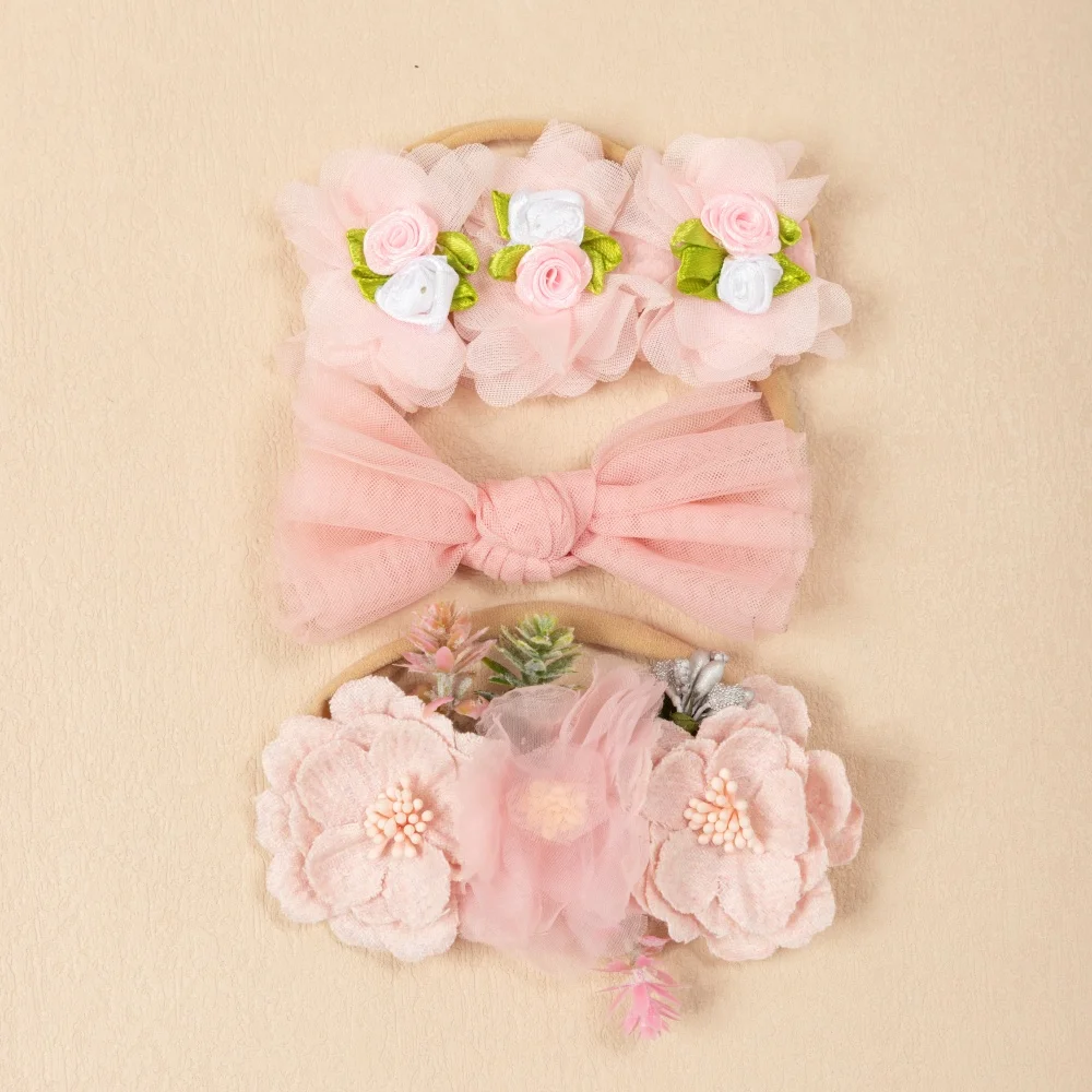 Diadema elástica de nailon con lazo floral rosa para bebé niña - imagen 2