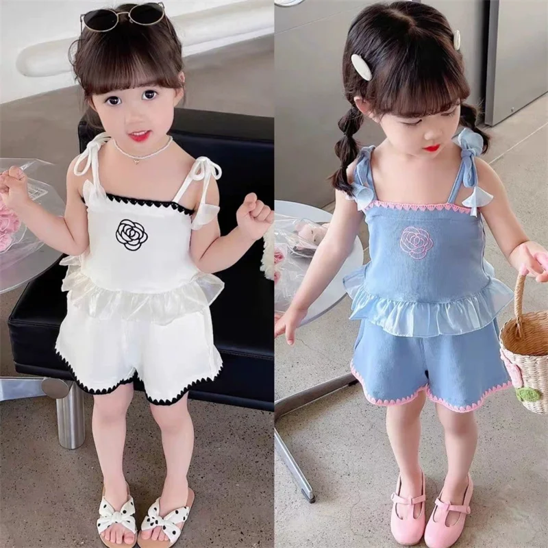 Conjunto infantil de flores con chaleco sin mangas