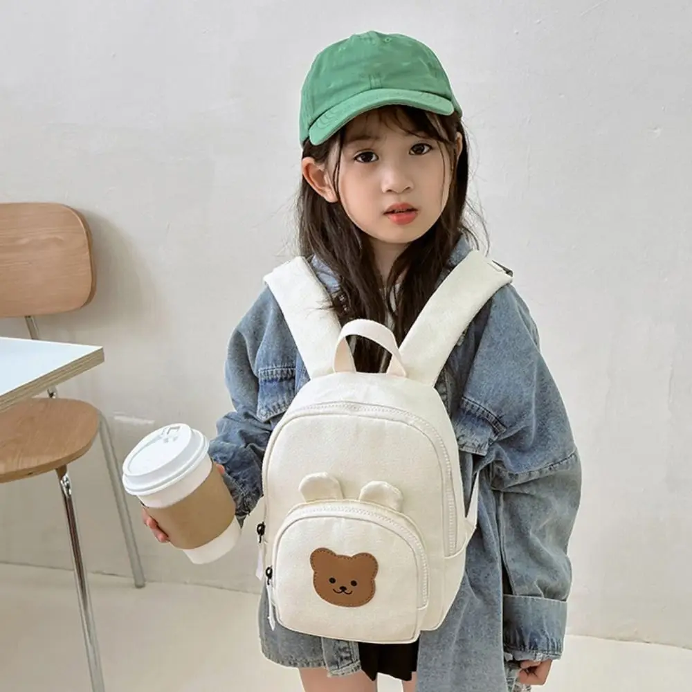 Mochila escolar de lona con dibujo de oso ajustable para niños - imagen 4