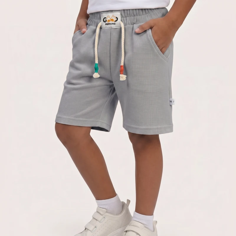 Pantalones cortos de niño color caramelo con cintura elástica - imagen 3