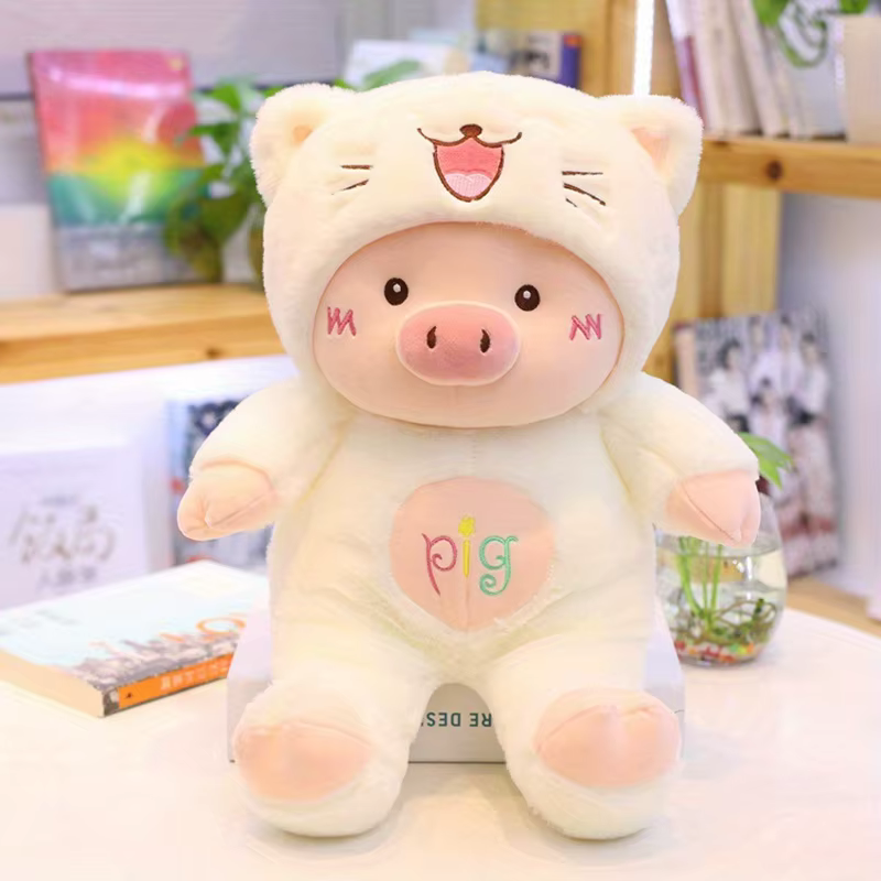 Variedad de colores del cerdo peluche