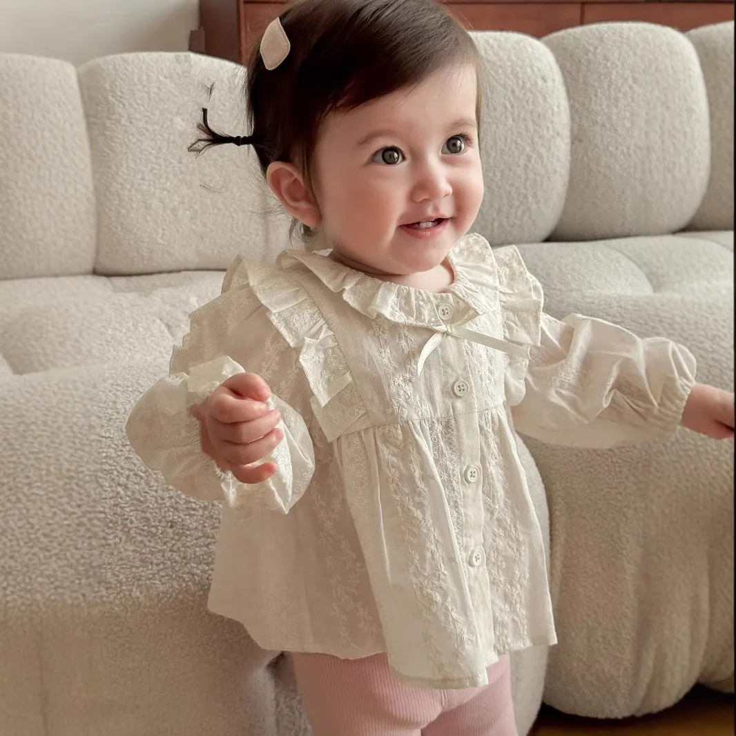 Blusa infantil floral de algodón cuello redondo