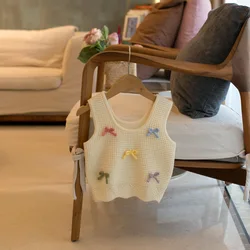 Jersey de punto con lazo para niña – Prenda infantil de vestir elegante