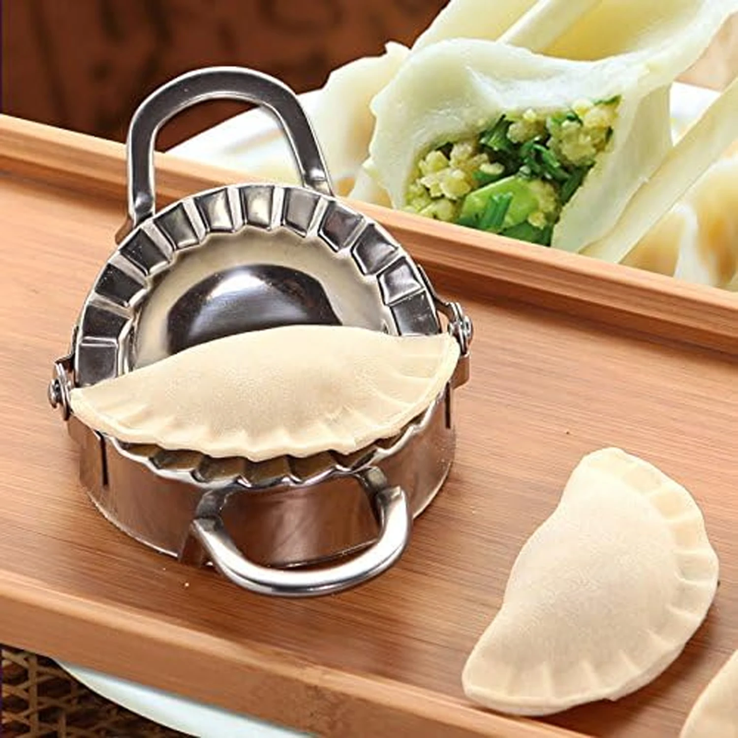 Máquina para hacer dumplings de acero inoxidable JAH en uso