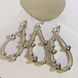 Pulsera antidesaparición para móvil con abalorios de corazón