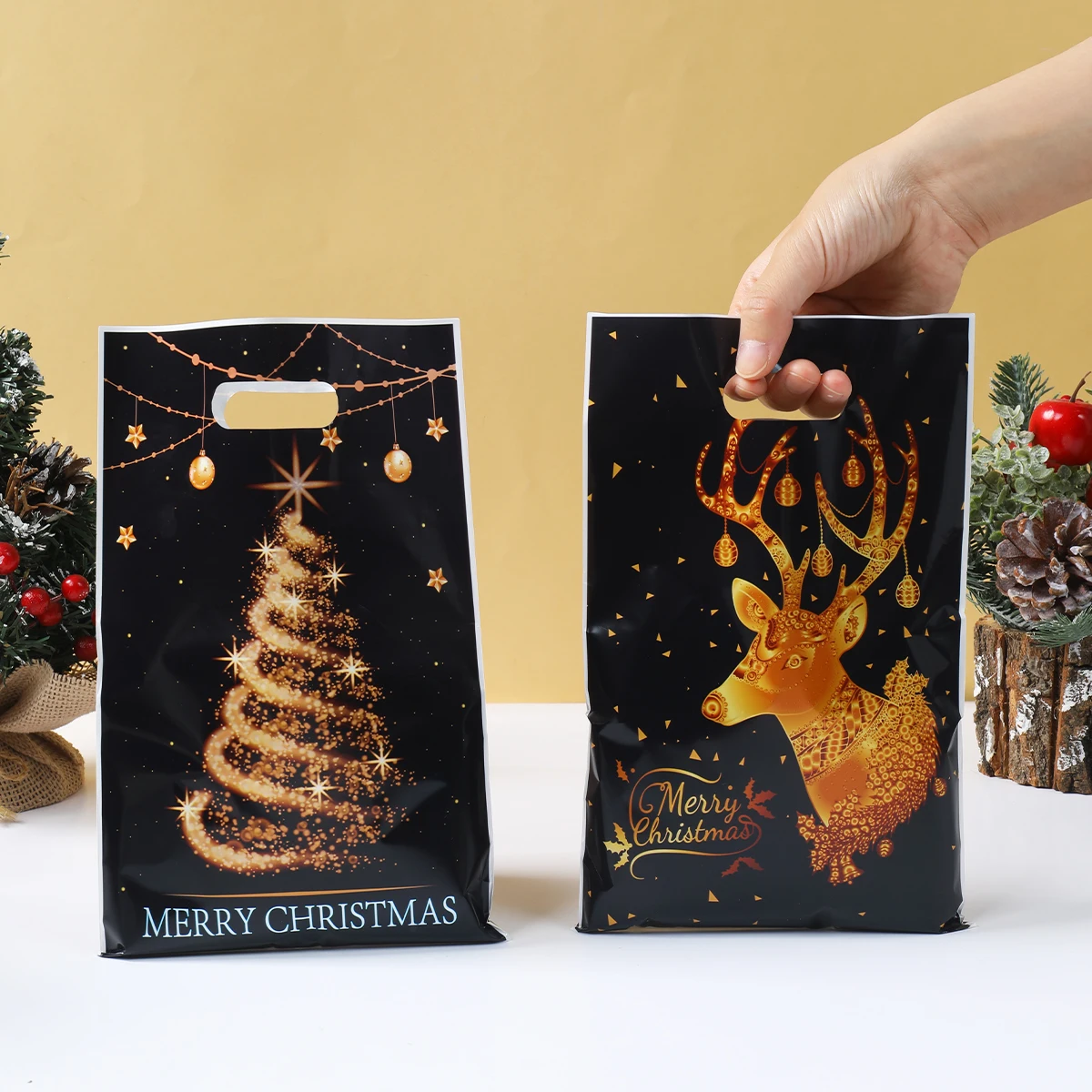 Bolsa regalo Navidad dorada y negra – Plástico resistente