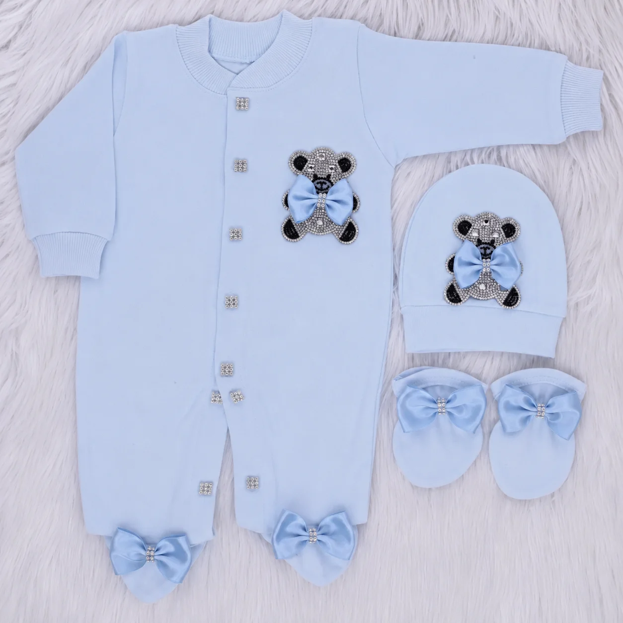 Conjunto recién nacido azul claro con pelele y broches completos - imagen 5