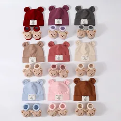 Conjunto gorro de oso y calcetines cálidos para recién nacido
