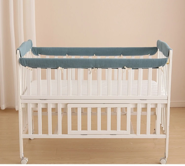 Almohadillas para proteger los bordes de la cuna