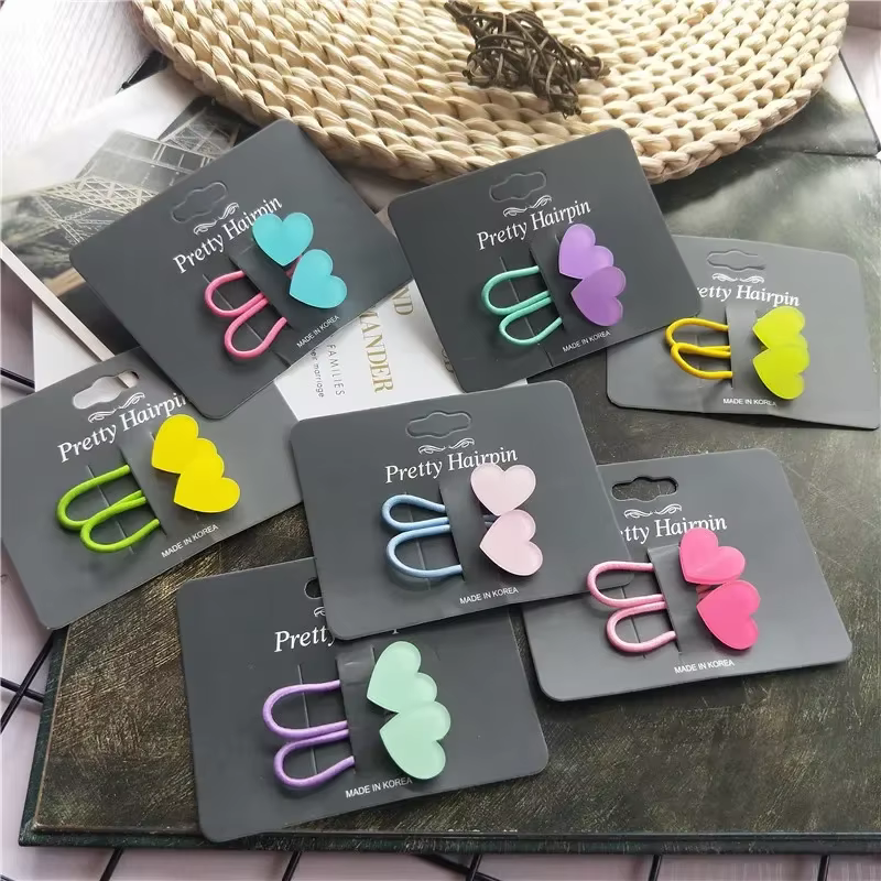 Pack de bandas elásticas con formas de corazón y estrella en colores fluorescentes