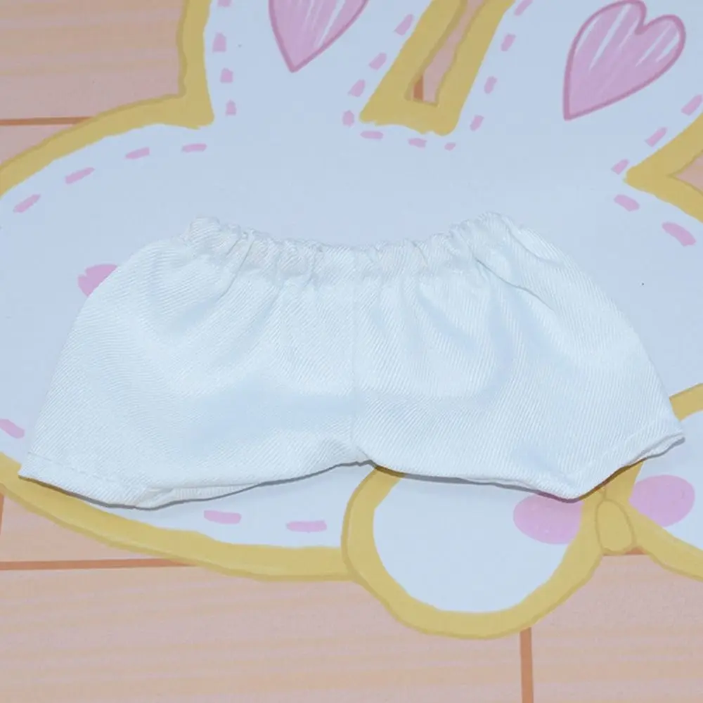 Ropa para muñecas: camiseta a rayas y pantalón vaquero corto - imagen 3