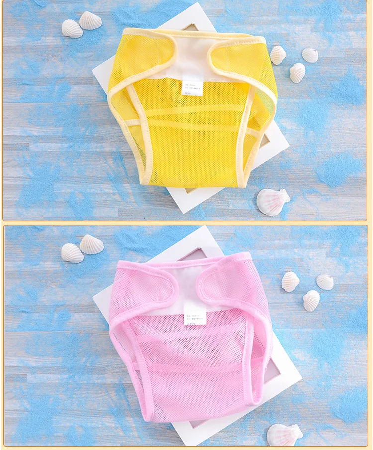 Pañal reutilizable grueso para bebé mostrando su diseño de 10 capas y ajuste tipo pantalón