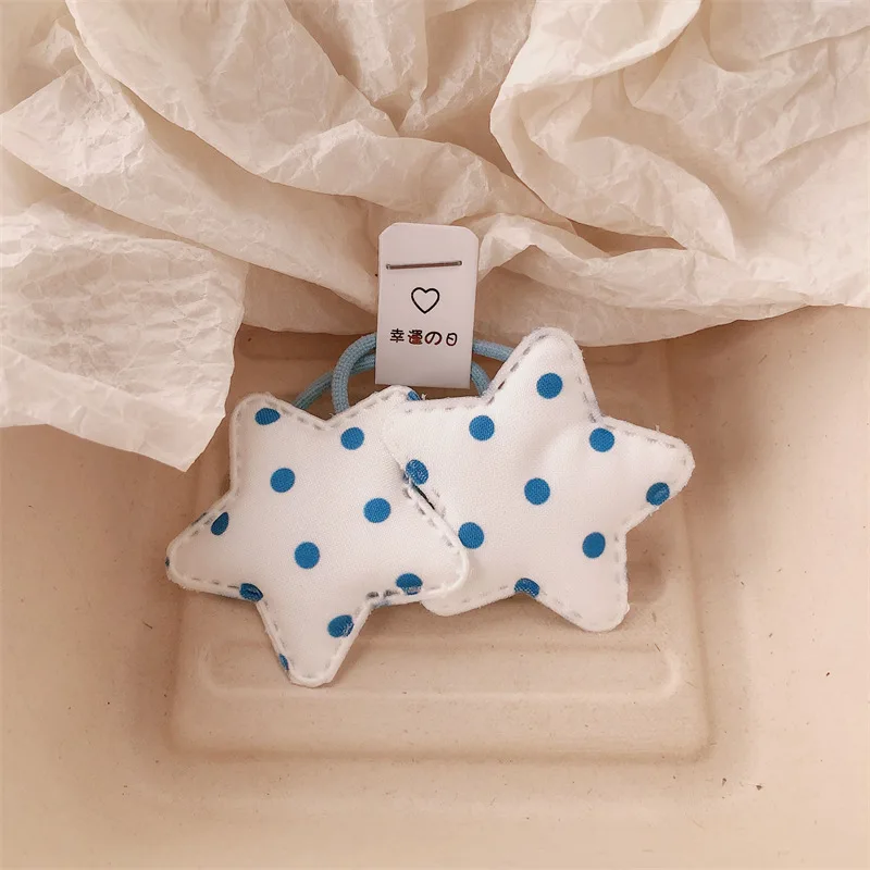 Coletero elástico con estrellas y puntos azules para niñas