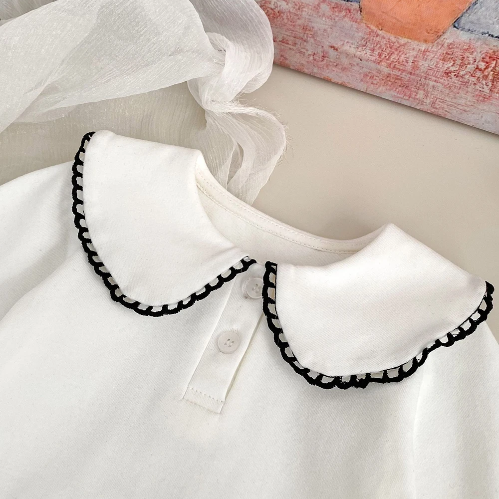 Vestido niña sin mangas de lunares con volantes para primavera