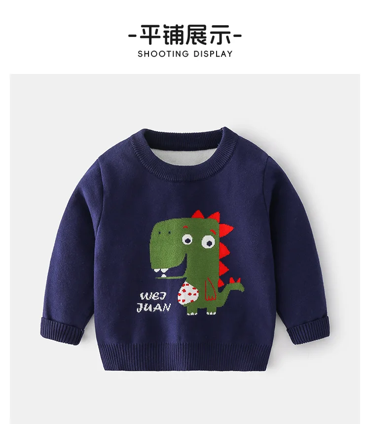 Detalle del patrón Jacquard con dinosaurios