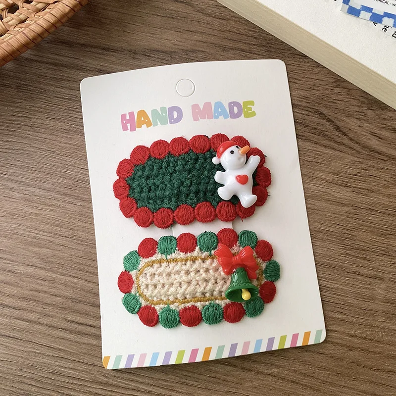 Pinzas para el pelo infantiles de encaje ovalado con Papá Noel