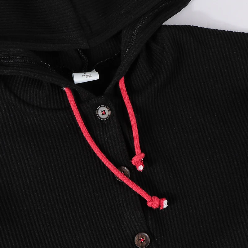 Camiseta negra acanalada para niña con capucha y botones - imagen 4