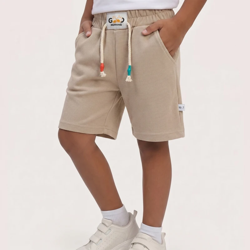 Pantalones cortos de niño color caramelo con cintura elástica - imagen 2