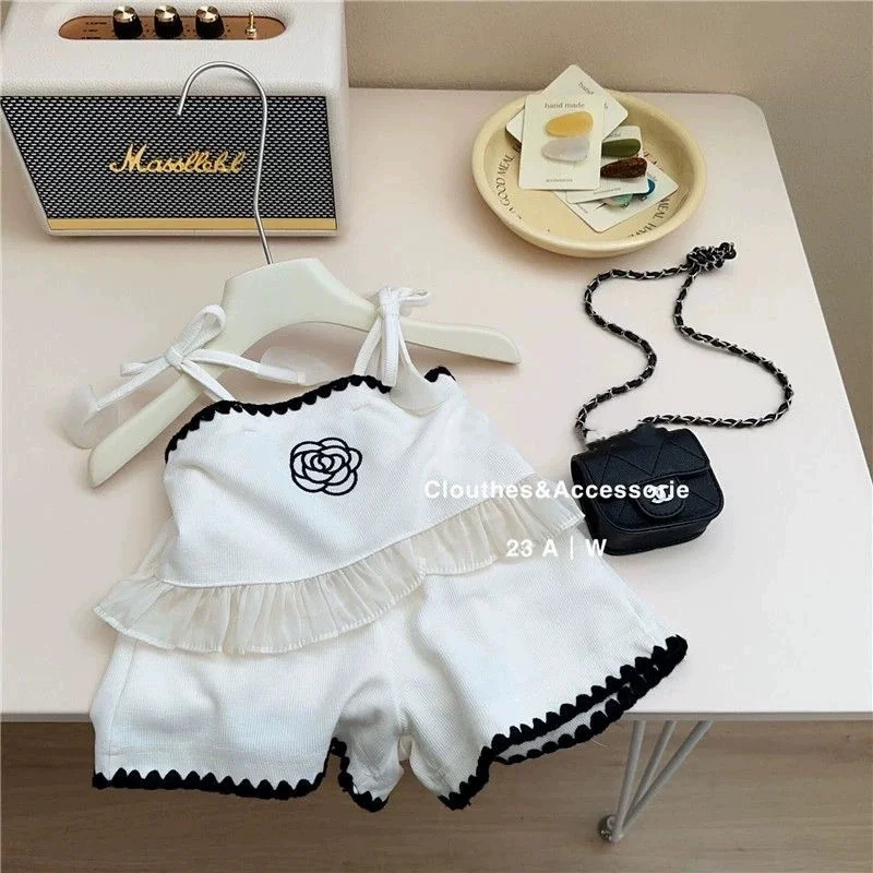 Conjunto de chaleco bebé de verano con pantalón corto y flores - imagen 4