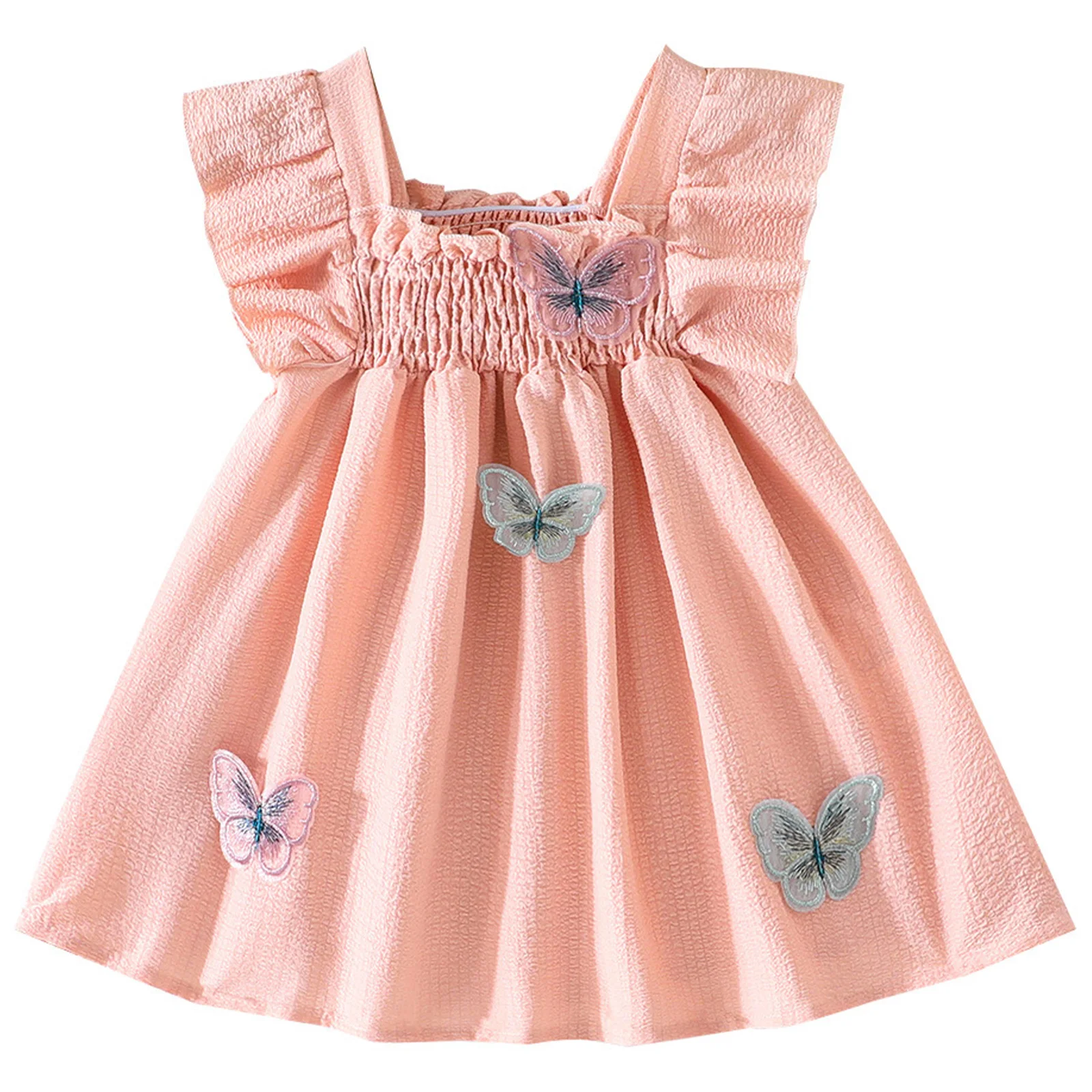 Detalle de la mariposa 3D en el vestido