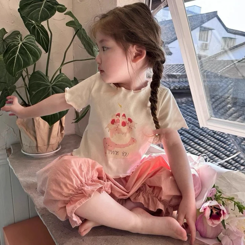 Conjunto de niña top y pantalón manga corta con estampado de dibujos - imagen 3