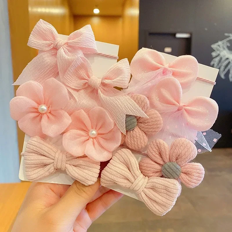 Conjunto de 10 diademas con flores