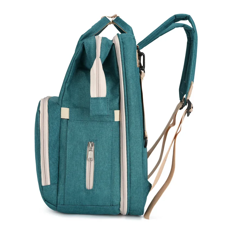 Bolsa de pañales con cambiador y portabiberones para bebé - imagen 3