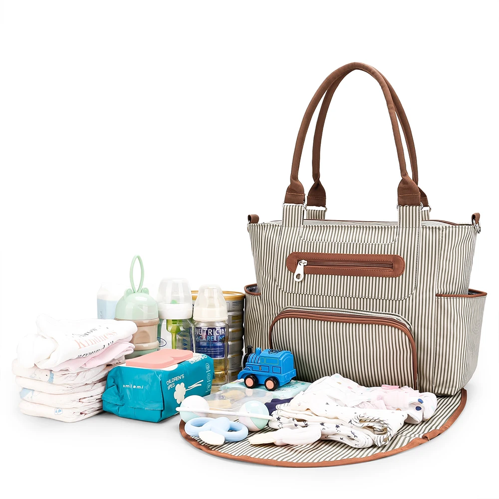Bolsa de pañales a rayas beige con accesorios a juego y bolsillos - imagen 3