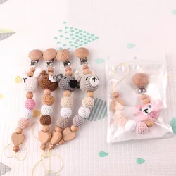 Clips para chupete en madera de haya anticaída con soporte