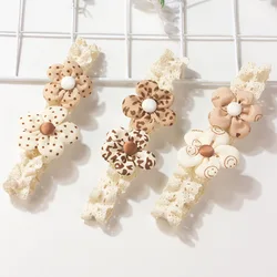 Diadema bebé con flores 3D y estampado leopardo suave