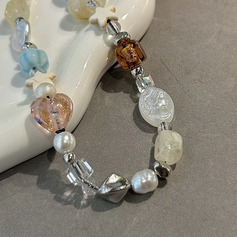 Cadena para móvil con perlas y charm antiestravío - imagen 3
