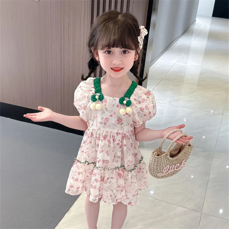 Vestido veraniego para niña con mangas abullonadas y estampado floral - imagen 4